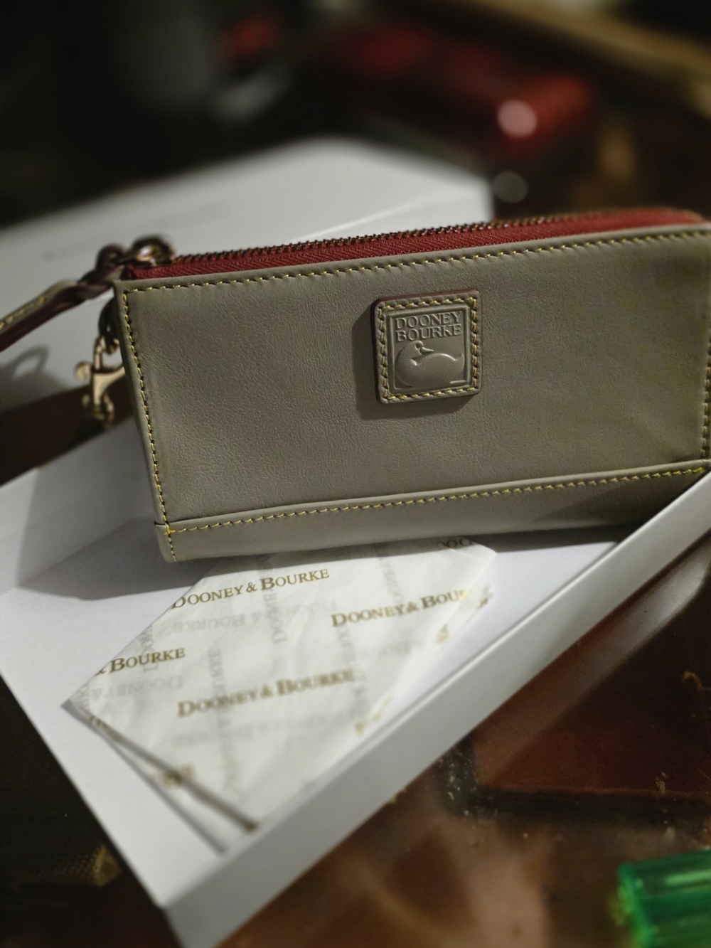Dooney & Bourke Taupe Leather Wristlet with Red Zipper